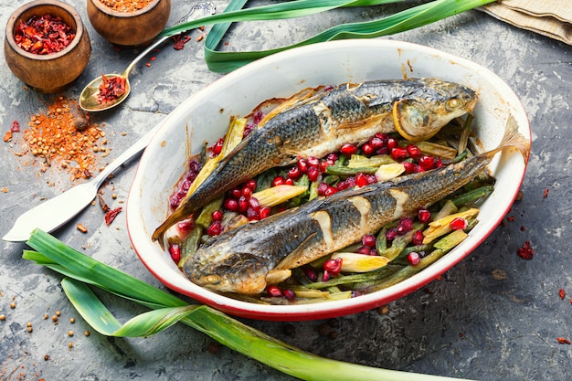 Baked fish with pomegranate