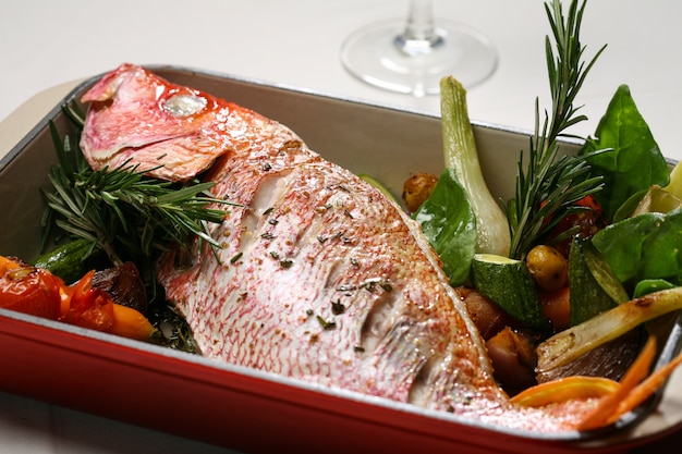 Baked fish with vegetables