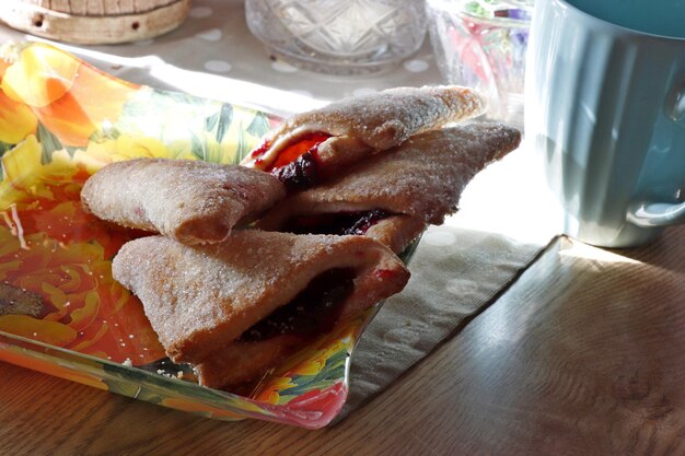 Baked goods on a plate in the bright morning sun