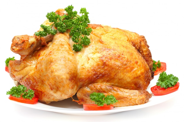 baked holiday turkey with garnish isolated on white