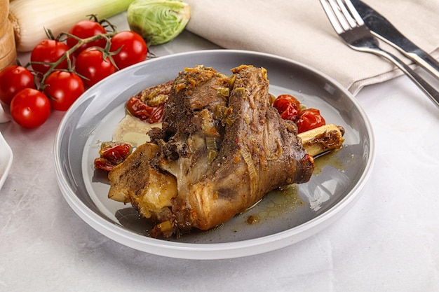 Photo baked lamb shank with bone