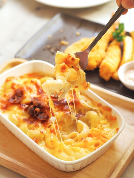 Baked macaroni and cheese on white dish