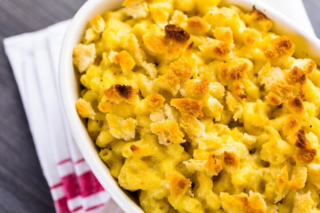 Baked macaroni and cheese with bread crumbs.