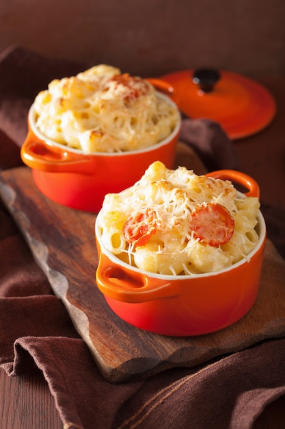 Baked macaroni with cheese in orange casserole