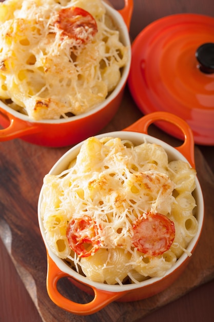 Baked macaroni with cheese in orange casserole