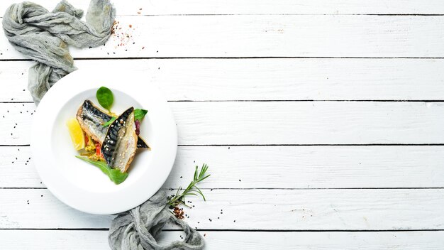 Baked mackerel fillet with vegetables Top view Free space for your text