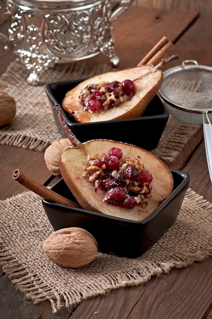 Baked pears with cranberries, honey and walnuts