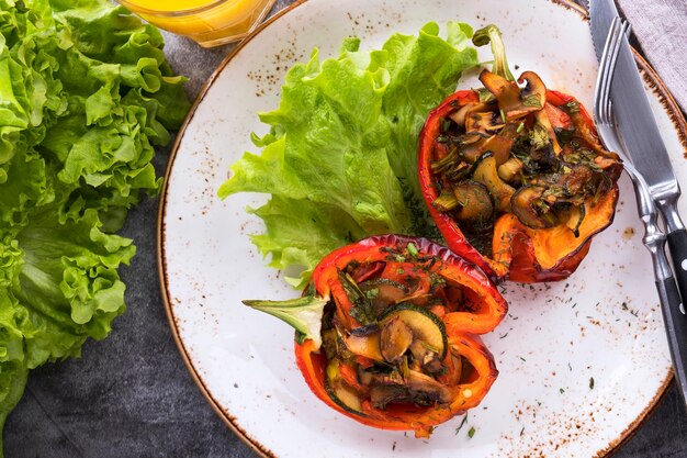 Baked pepper with vegetables on a plate. Diet food. Healthy concept.  Top view.