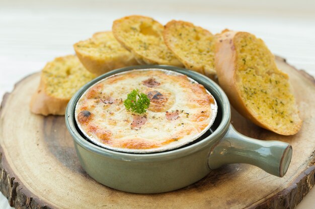 baked pizza dip with Garlic bread.