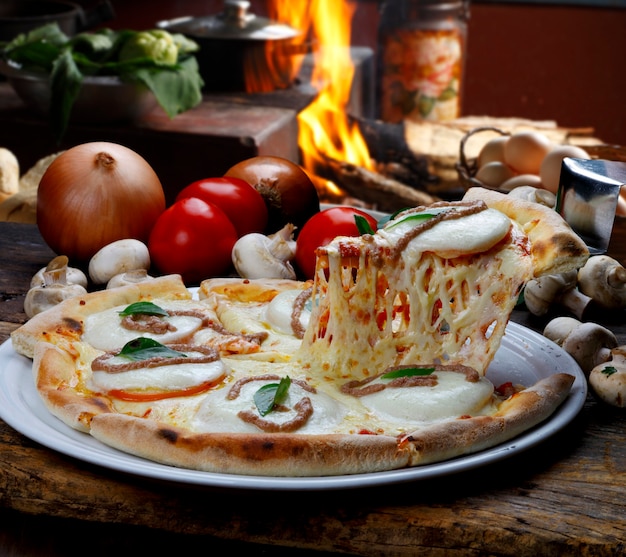 Baked pizza in the wood oven