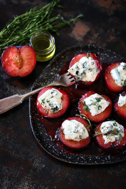 Baked plums with feta cheese