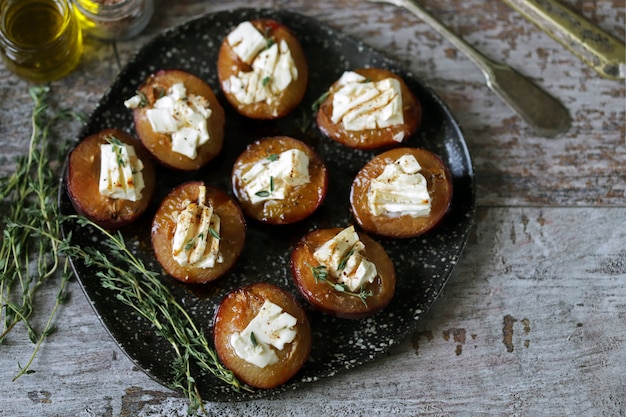 Baked plums with white cheese