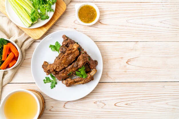 Photo baked pork ribs with sauce