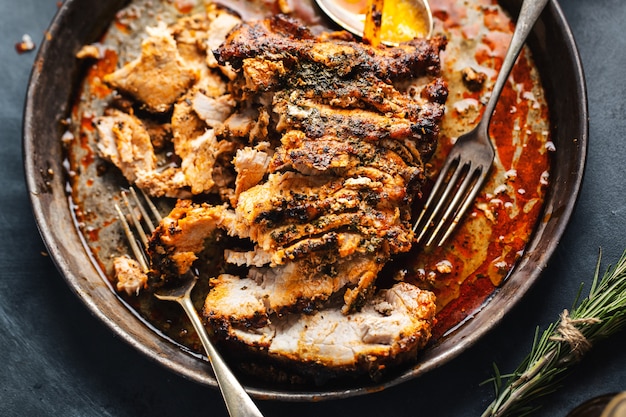 Baked pork with spices and herbs