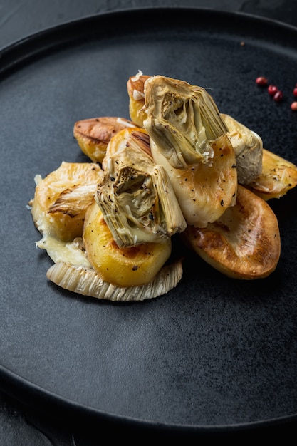 Baked potato and artichoke with fennel al forno