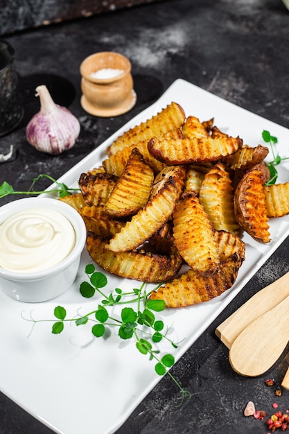 Baked potato slices on a light background