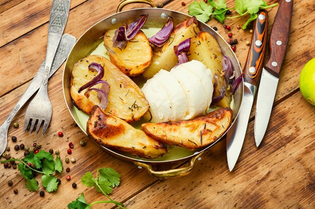 Baked potatoes with cheese