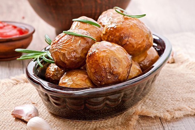 Baked potatoes with  rosemary