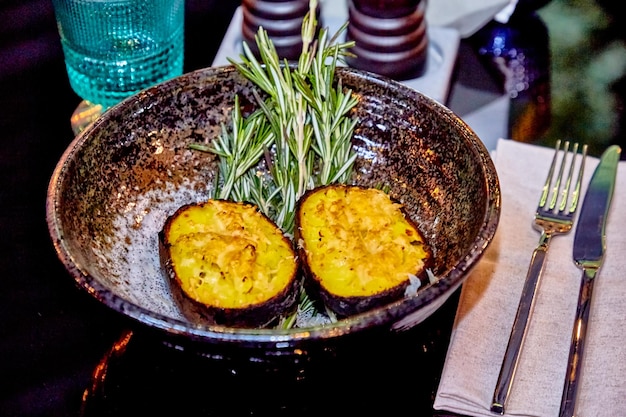 Baked potatoes with sour cream and pike caviar