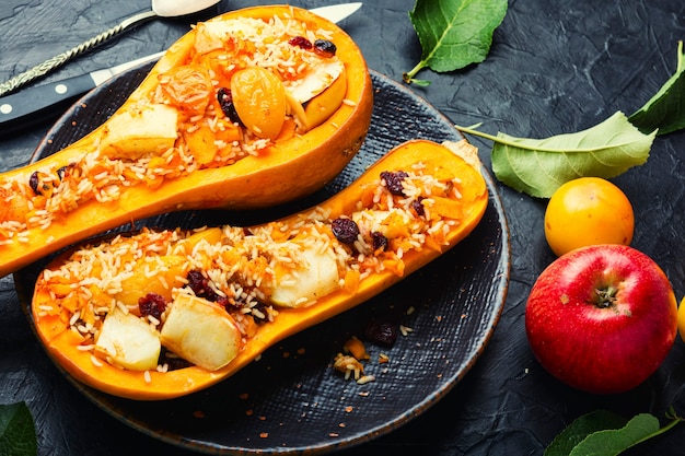 Baked pumpkin with apples, cherry plum and rice.Azerbaijan cuisine