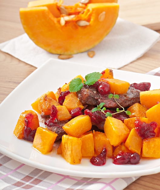 Baked pumpkin with meat and vegetables