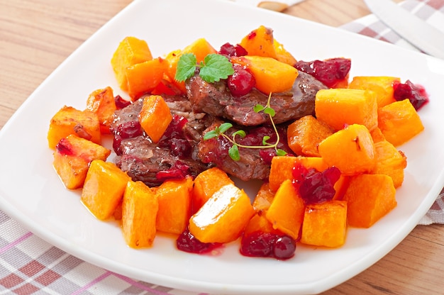 Baked pumpkin with meat and vegetables