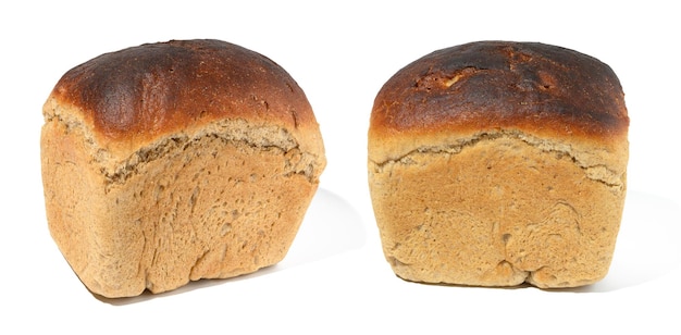 Baked rye flour bread in the shape of a brick on a white isolated background