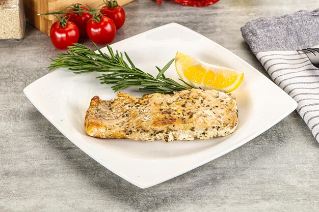 Baked salmon fish served rosemary