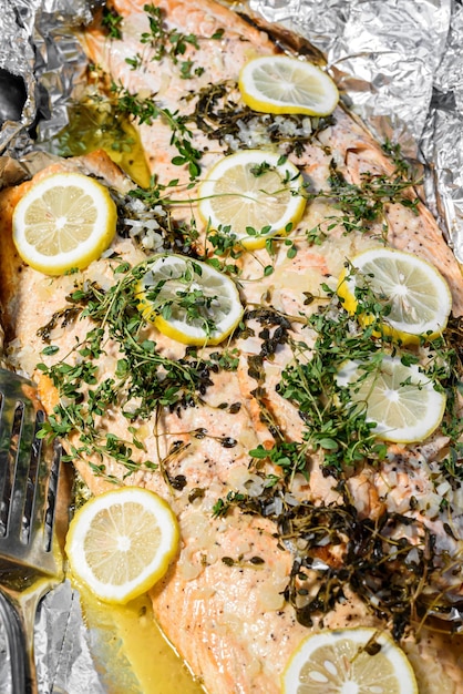 Baked Salmon with lemon and herbs in foil