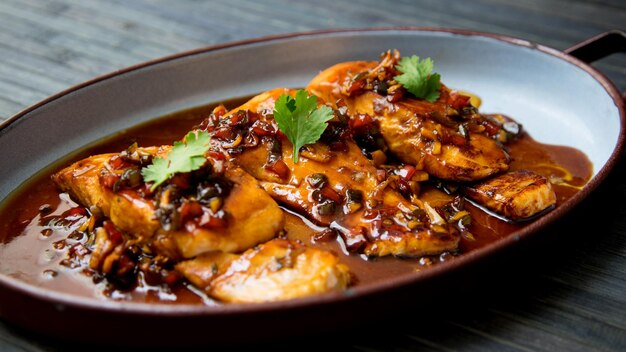 Baked salmon with soy sauce and honey accompanied by rice. Traditional Japanese recipe.