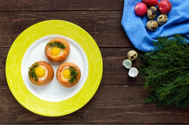 Baked small buns with eggs and herbs