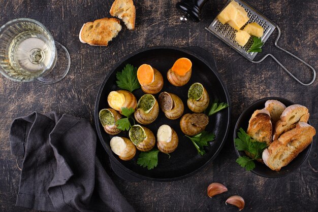 Baked snails escargot with bread