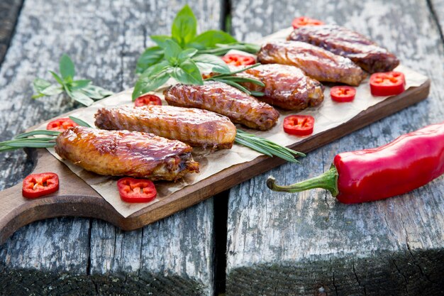 Baked spicy chicken wings in the Asian style