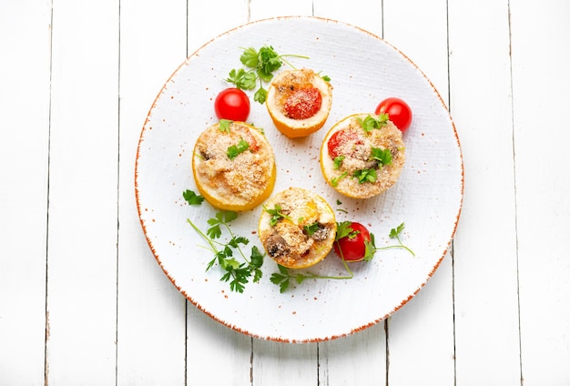 Baked squash and zucchini filled with quinoa Vegan dish