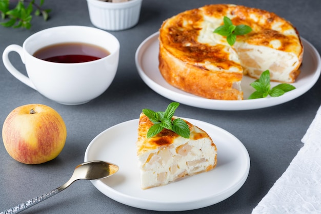 Baked Sweet Cottage Cheese casserole with apple decorated mint