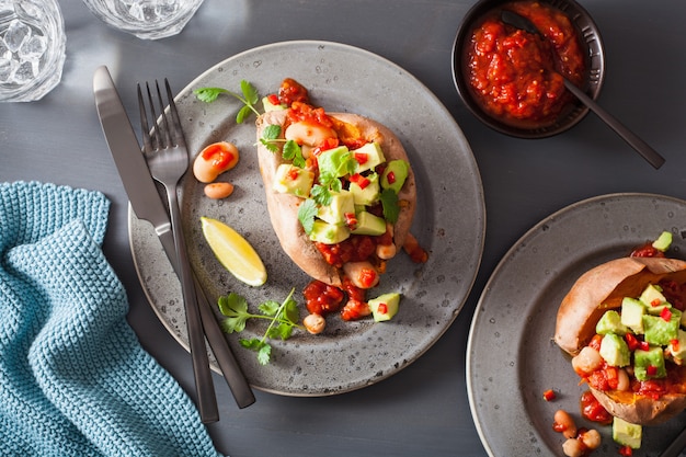 Baked sweet potatoes with avocado and beans