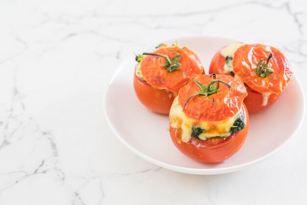  baked tomatoes stuffed with cheese and spinach 