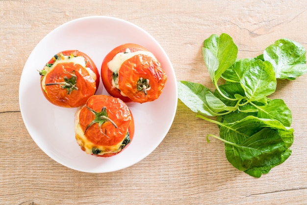  baked tomatoes stuffed with cheese and spinach 