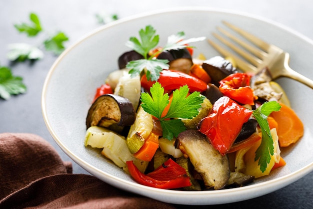 Baked vegetables salad with fresh parsley