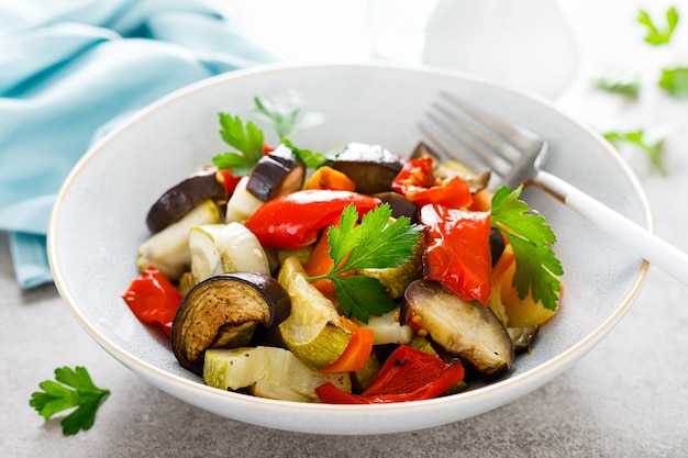 Baked vegetables salad with fresh parsley