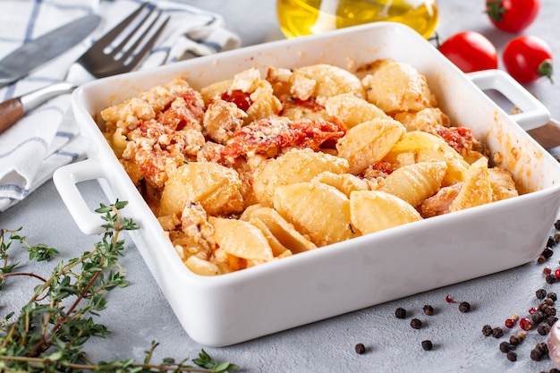 Baked vegetables with feta cheese, olives, onions, Provencal herbs, olive oil, spices and tomatoes