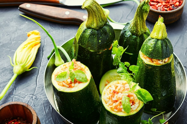 Baked zucchini stuffed with carrot and rice