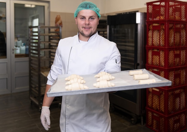 Baker Making Croissant Before Going to the Oven