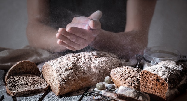 Baker with flour in hand