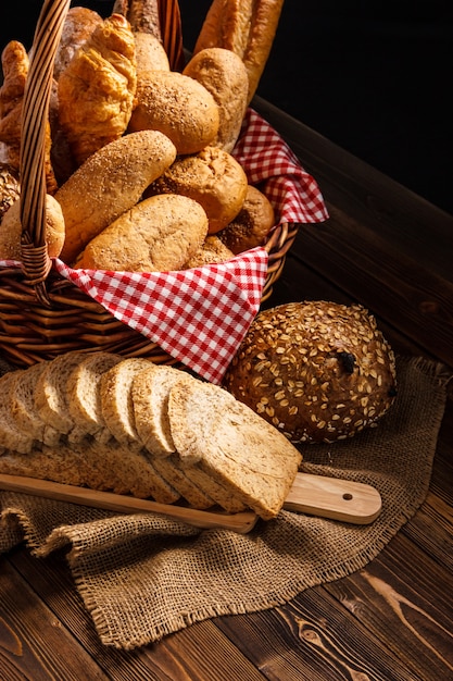 Bakery Assortment on wooden table dark background