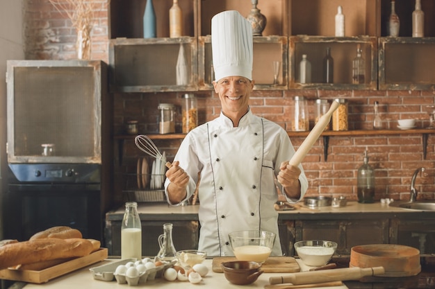 Bakery chef cooking bake in the kitchen professional