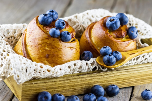 Bakery in tray with fresh blueberries