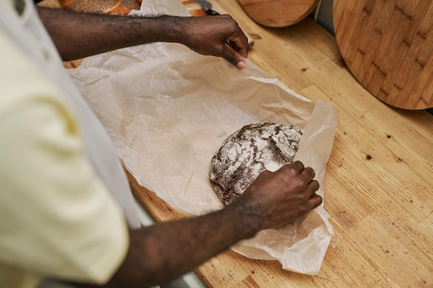 Bakery Worker Wrapping Bread