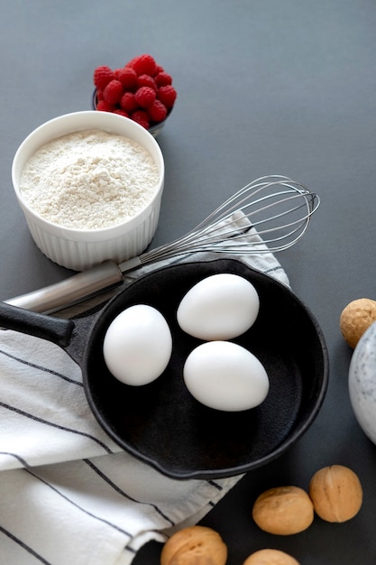 Baking Cake Ingredients Laid Out On A Dark  