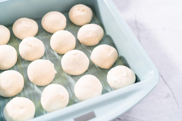 Baking dinner rolls from the premade frozen dough in the baking\
pan